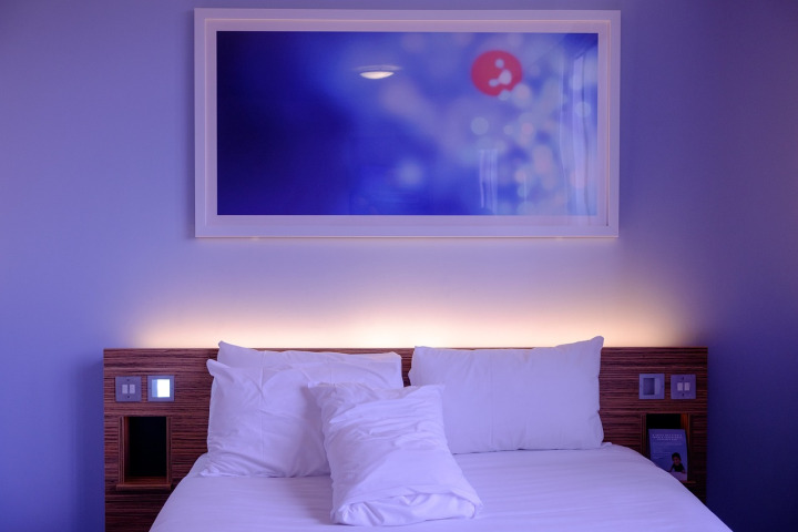 furnished bedroom minimalist bright
